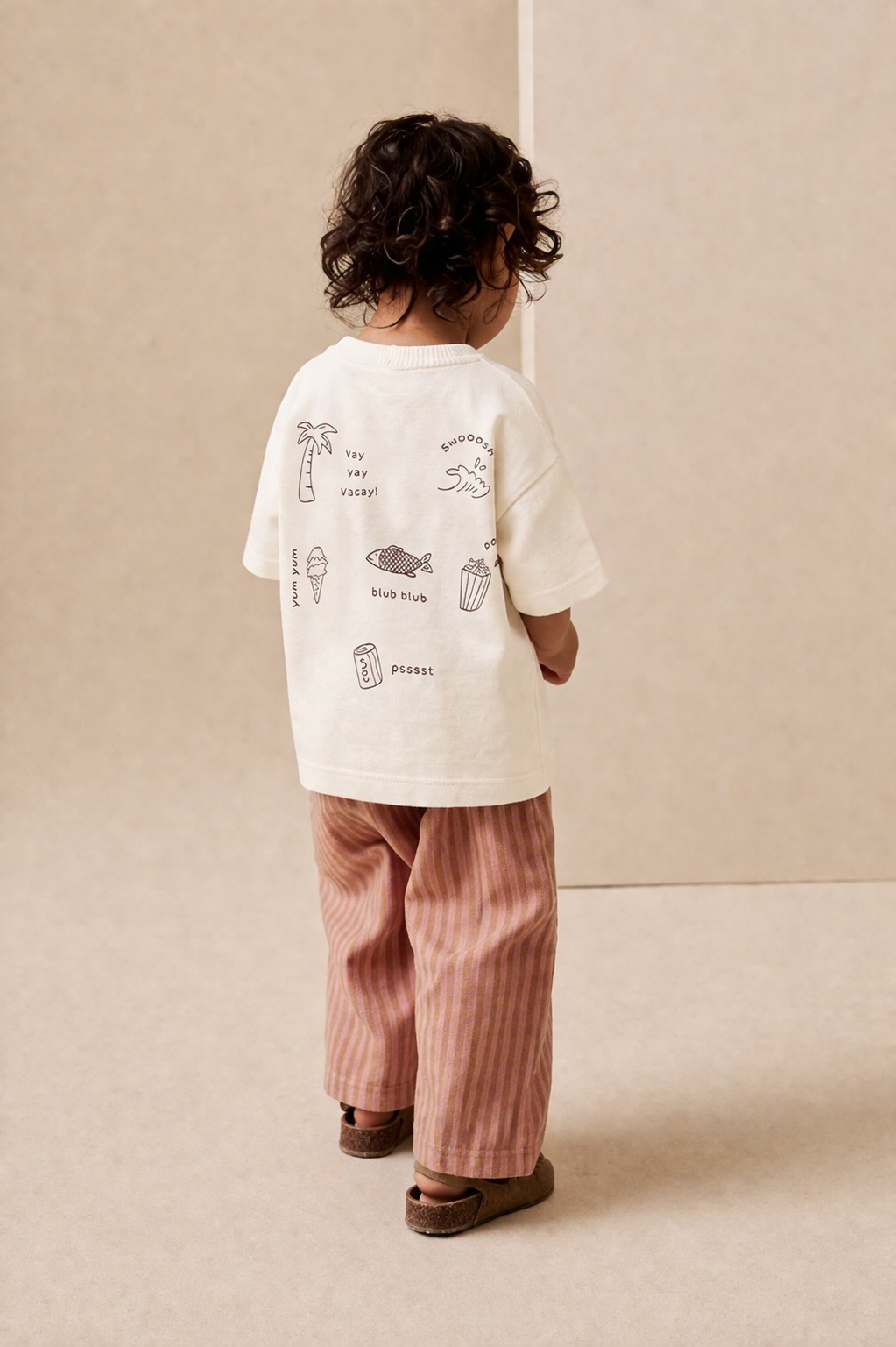 Lifestyle family photo featuring Boo and Coo blush stripe wide leg pants