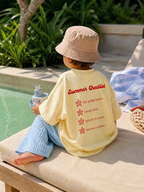 Close lifestyle view of Boo and Coo Ciao Summer oversized t-shirt back print