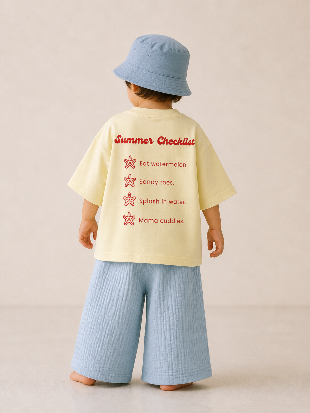 Full back view of Boo and Coo Ciao Summer oversized t-shirt for toddlers
