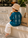 Toddler wearing Boo and Coo Gelato Club oversized t-shirt with gelato illustration back print