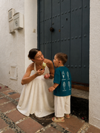 Lifestyle photo of children wearing Boo and Coo Gelato Club oversized t-shirts