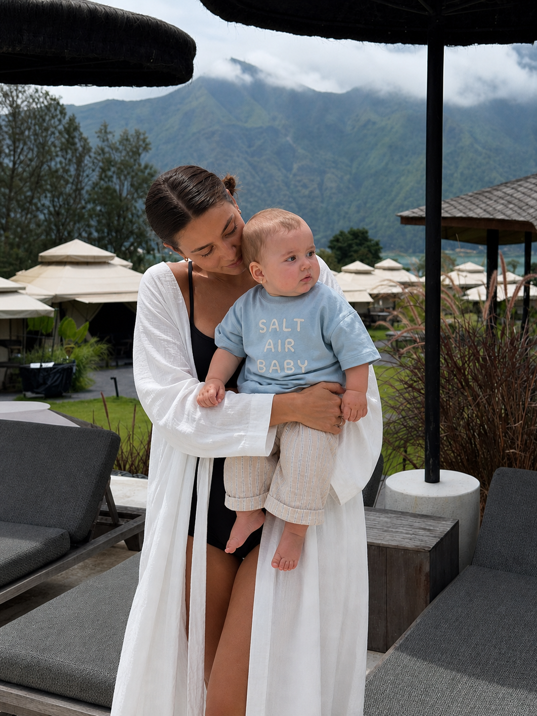 Family lifestyle photo featuring Boo and Coo Salt Air Baby oversized t-shirt