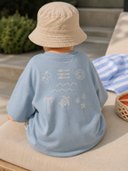 Back view of toddler wearing Boo and Coo Salt Air Baby oversized t-shirt
